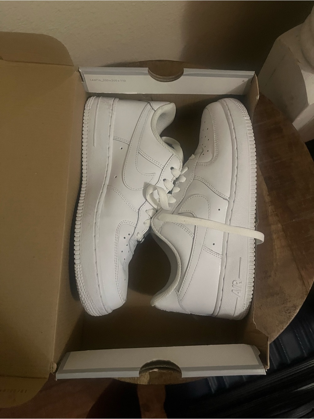 Nike women’s  All-White Low-Top Sneakers